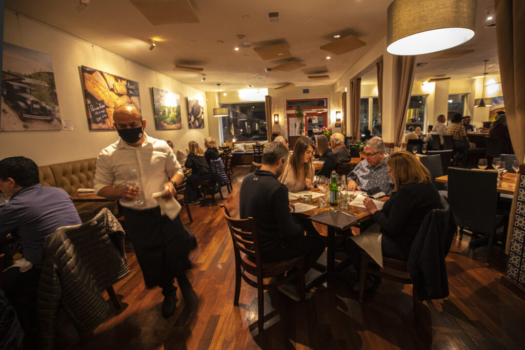 Dinner guest enjoy the vibe at Sonoma Grille in Sonoma on Friday February 4, 2022. (Chad Surmick / The Press Democrat)