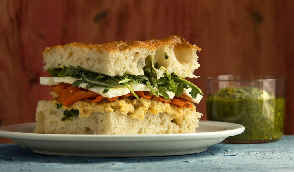 Smashed Chickpea and Chermoula Sandwich on house made focaccia with roasted carrots, pickled onions, feta and arugula from the Miracle Plum Kitchen in Santa Rosa. (John Burgess/The Press Democrat)