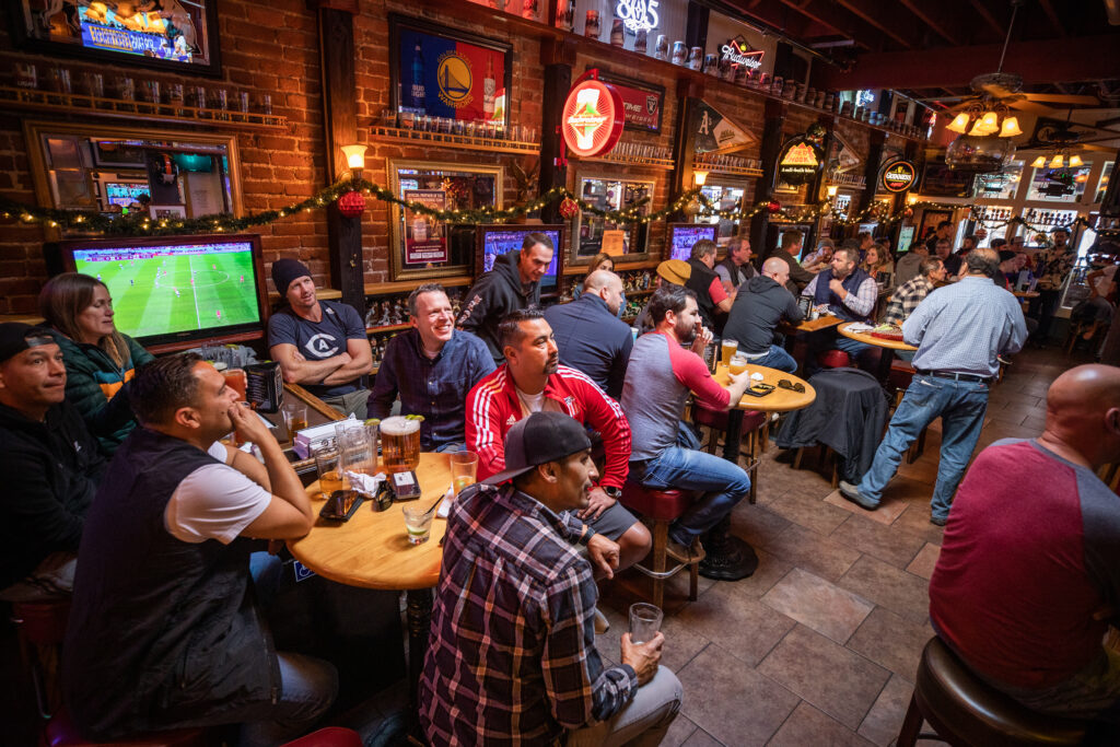World Cup fans watch the USA beat Iran, 1-0, at Ausiello’s 5th Street Bar & Grill in Santa Rosa Tuesday, November 29, 2022. The US advances to the knock out round where they play the Netherlands Saturday. (John Burgess/Press Democrat)