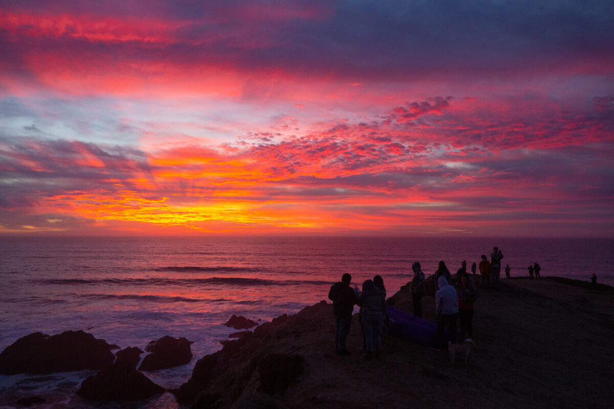Visitors are treated to a spectacular sunset at Bodega Head in Bodega Bay on Friday, Jan. 15, 2021. (Alvin Jornada / The Press Democrat)