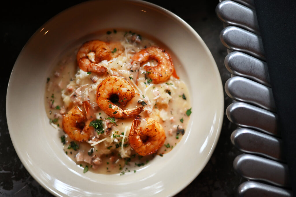 Shrimp and grits with chorizo sausage creole gravy at Agriculture Public House at Dawn Ranch in Guerneville. (Erik Castro/For The Press Democrat)