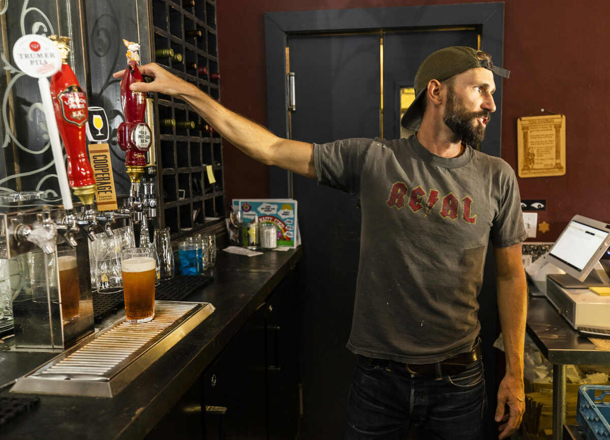 Bartender Colin Carney serves up a pint of Old Speckled Hen fine ale at the Toad in the Hole Pub in Santa Rosa, Saturday, Sept. 8, 2022. (John Burgess/The Press Democrat)