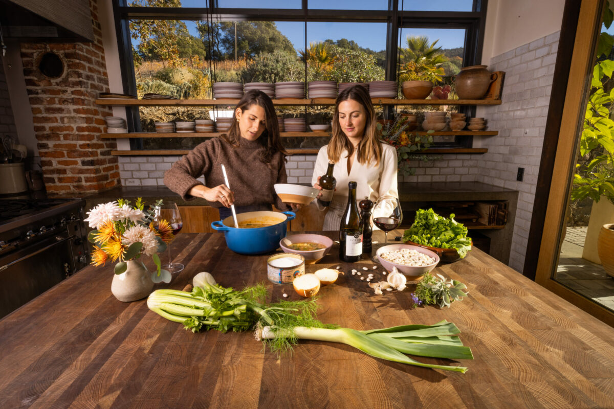 Kelly Mariani, culinary director/co-owner of Scribe Winery, right, and chef Kirsten Watley prepare their Vegetarian Escarole and White Bean Soup in the Scribe Kitchen, Sonoma. (John Burgess/Press Democrat)