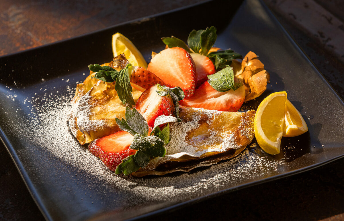 Valentine's Day Sweet Crepes with strawberries, lemon and powdered sugar from chef John Ash Friday, January 27, 2023. (John Burgess/Sonoma Magazine)
