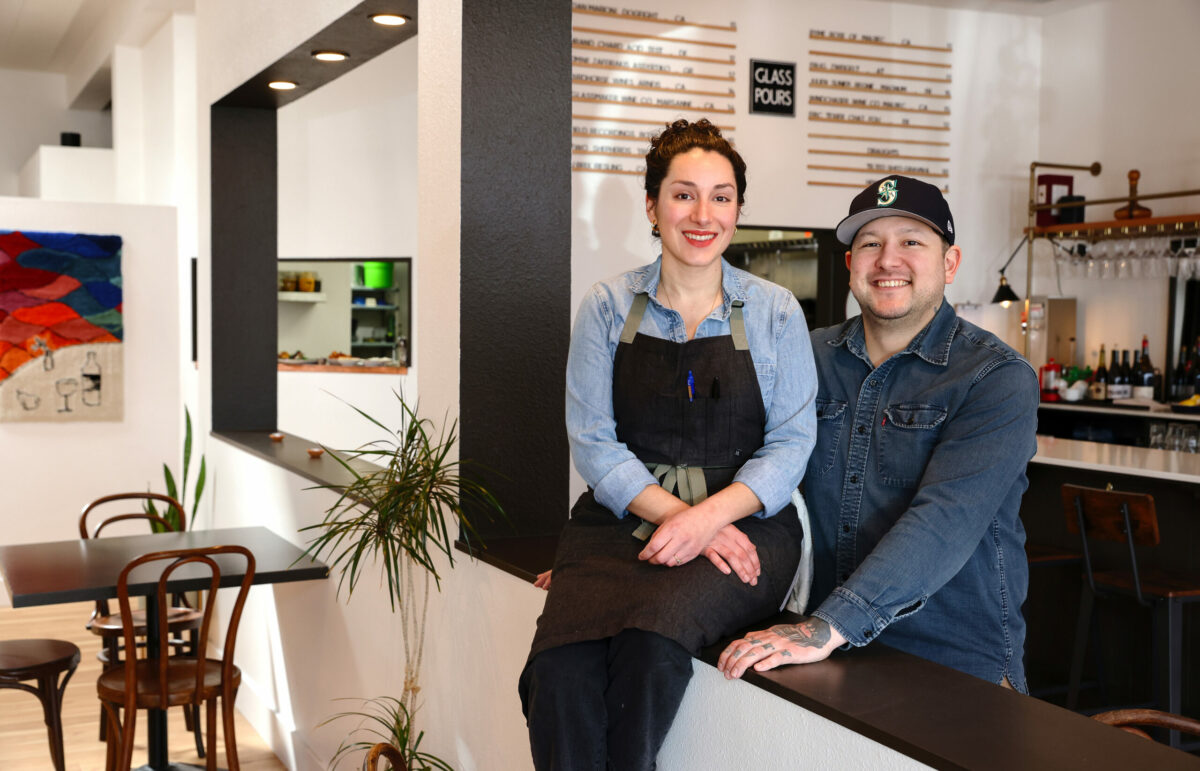 The Redwood co-owners Geneva Melby, left, and Ryan Miller at their natural wine bar in Sebastopol on Friday, February 24, 2023. (Christopher Chung/The Press Democrat)