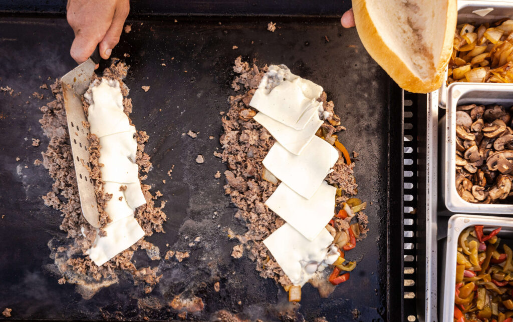 Chris Amadio, owner of Mamadio’s, makes about 200 cheesesteaks on his regular Friday night, March 7, 2025 pop-up at Parliament Brewing Co. in Rohnert Park. (John Burgess / The Press Democrat)