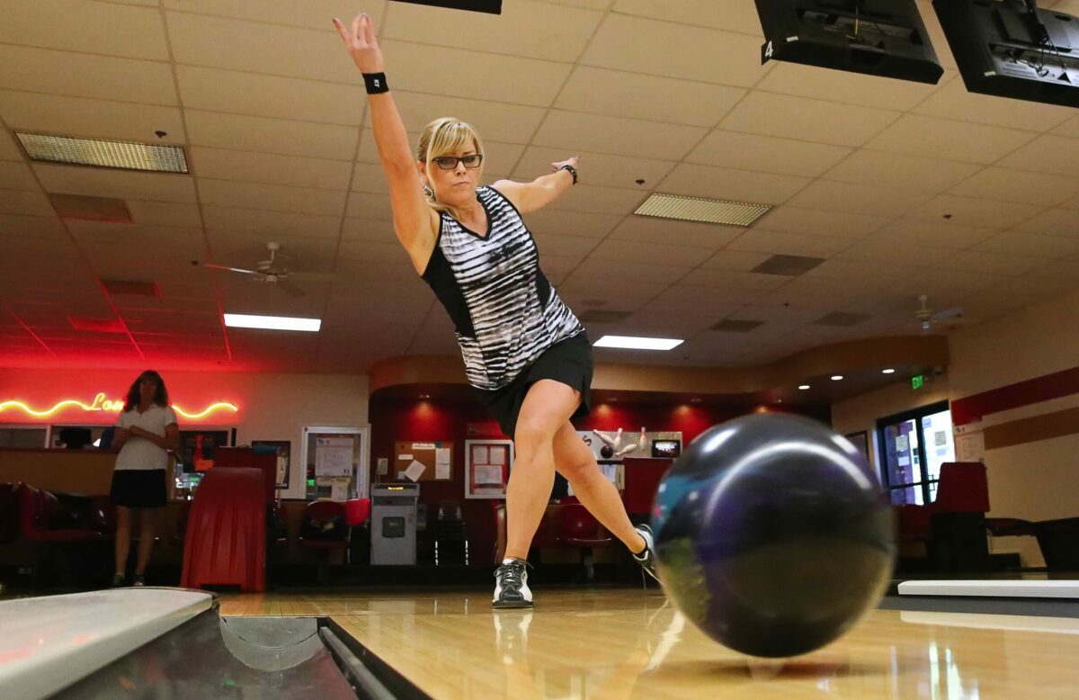 Julie Yokoyama bowls at Double Decker Lanes in Rohnert Park, on Friday, April 29, 2016. (Christopher Chung / The Press Democrat)