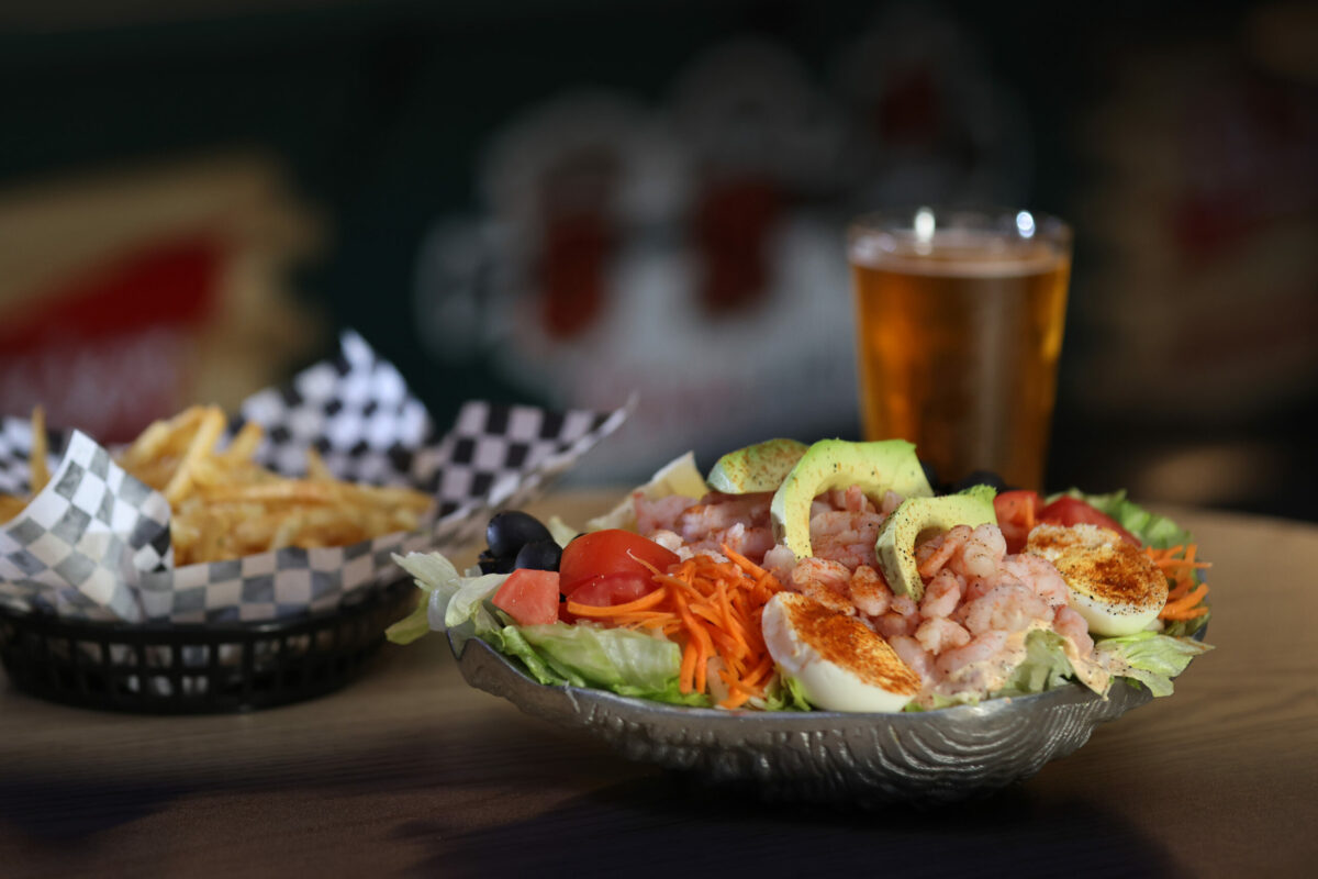 Shrimp Louie Salad and garlic fries at Steiner's Tavern in Sonoma. (Beth Schlanker/The Press Democrat)