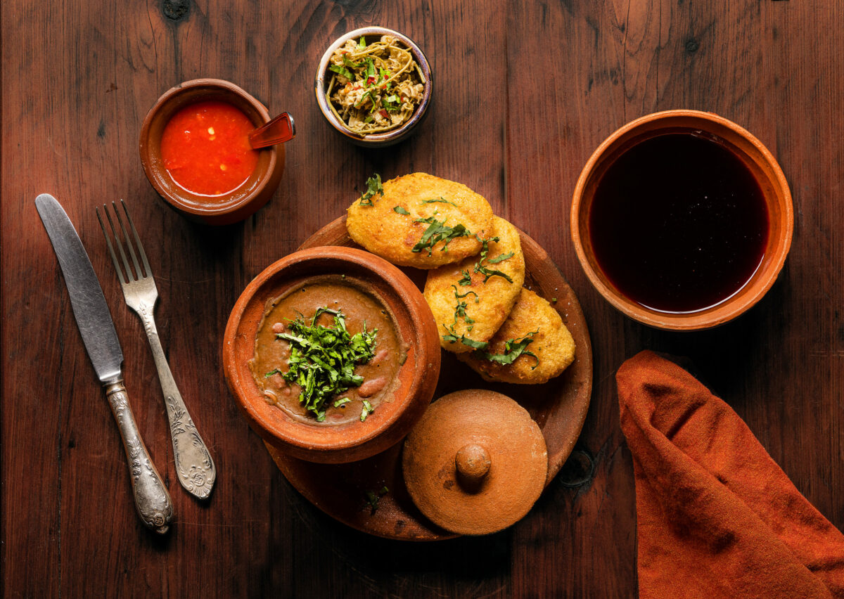 Chvistari & Lobio, Crispy Masa & Cheese Cakes with Fragrant Bean Stew and a Piala, a Georgian bowl for serving wine, from Piala Restaurant and Wine Bar in Sebastopol. (John Burgess/The Press Democrat)