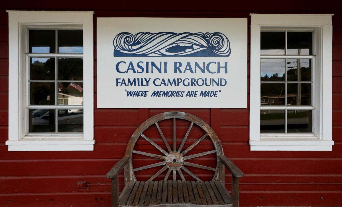 A Casini Ranch Family Campground sign hangs on the Recreation Hall building in Duncans Mills. (Christopher Chung/The Press Democrat)