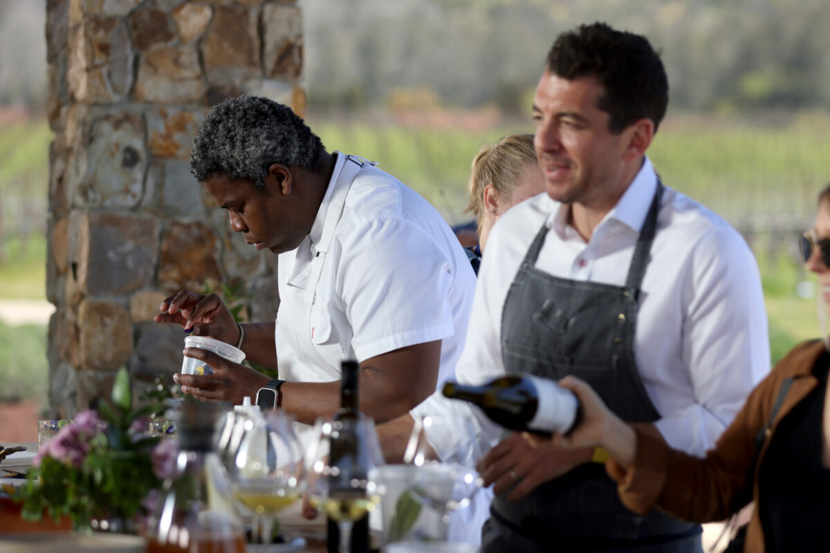 Table Culture Provisions owner and chef Stéphane Saint Louis, left, prepares a potato gratin and a creme brulee while Ari Weiswasser, chef and proprietor of the Glen Ellen Star, right, prepares vegetable paella, pepperoni pizza with egg yolk jam and vodka cocktails for a segment of NBC's "Today" show at St. Francis Winery in Santa Rosa, Thursday, April 20, 2023. (Beth Schlanker / The Press Democrat)
