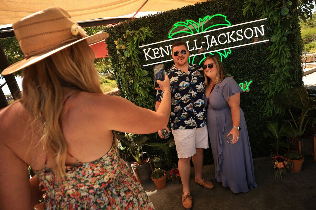 Brandon and Shannin Ugarte from Rohnert Park, have their picture made during the Taste of Sonoma, Saturday, June 25, 2022, held at the Jackson Family Wine Estate and Gardens near Santa Rosa. (Kent Porter / The Press Democrat) 2022