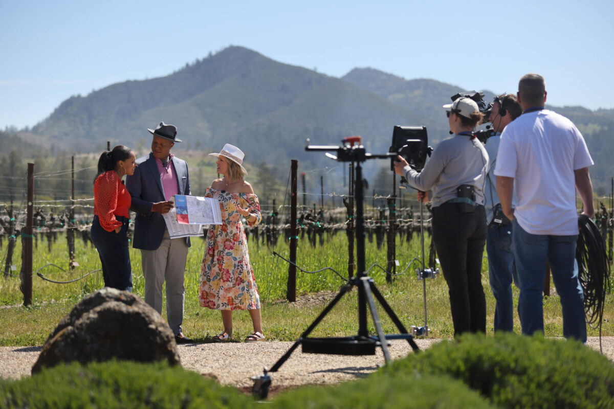 NBC's "Today" show third hour co-hosts Sheinelle Jones, left, Craig Melvin, center, and Dylan Dreyer tape an opening segment at St. Francis Winery in Santa Rosa, Thursday, April 20, 2023. (Beth Schlanker / The Press Democrat)
