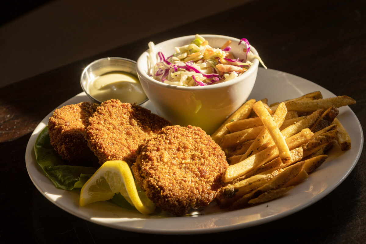 Crab Cakes with crispy fries and slaw from Americana in Santa Rosa. (John Burgess/The Press Democrat)