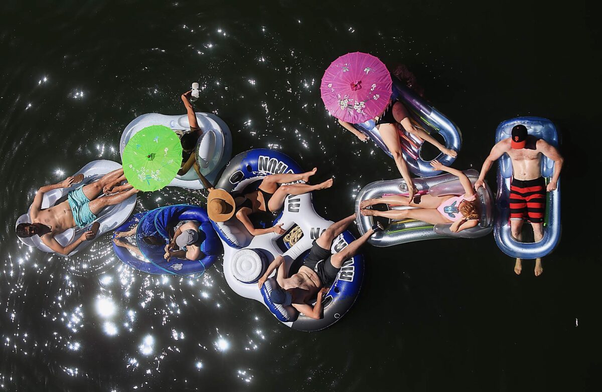 Fourth of July revelers enjoy a lazy float trip on the Russian River in Monte Rio. (Kent Porter / The Press Democrat) 2017