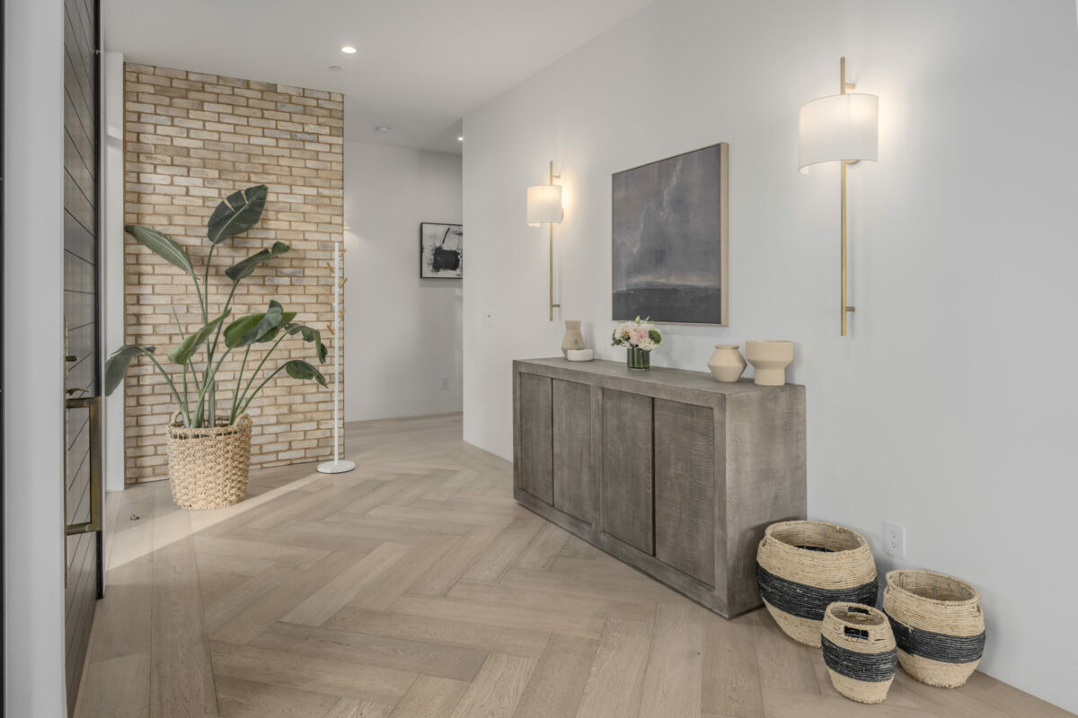 The foyer is styled with muted tones. (Provided by Carol Sebastiani of Sotheby's International Realty)