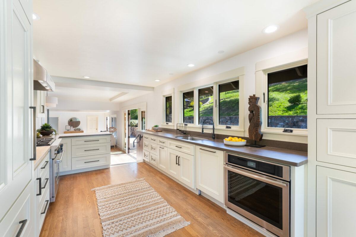 An open feel is achieved with the kitchen that opens to a dining area. Lots of windows add to the sense of spaciousness. (Ned Bonzi)