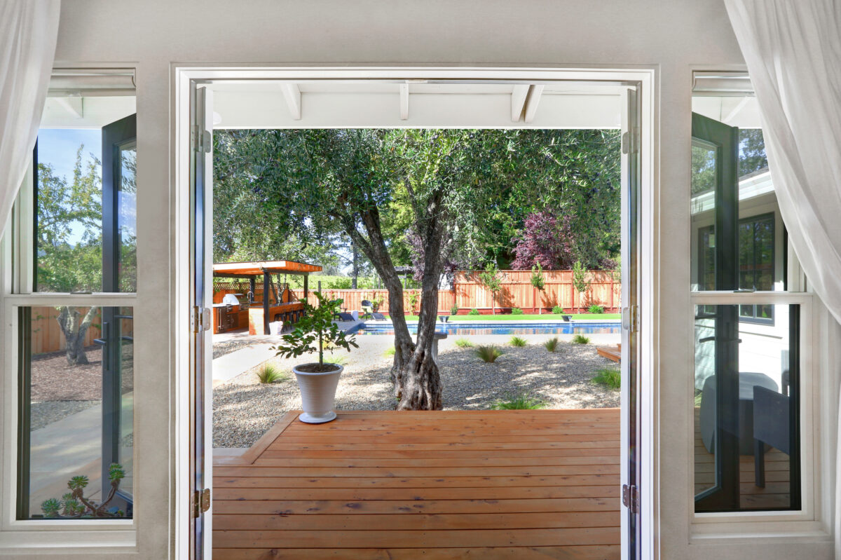 Double doors provide a view to the deck and xeriscape gardens. (Rick Bolen Photography)