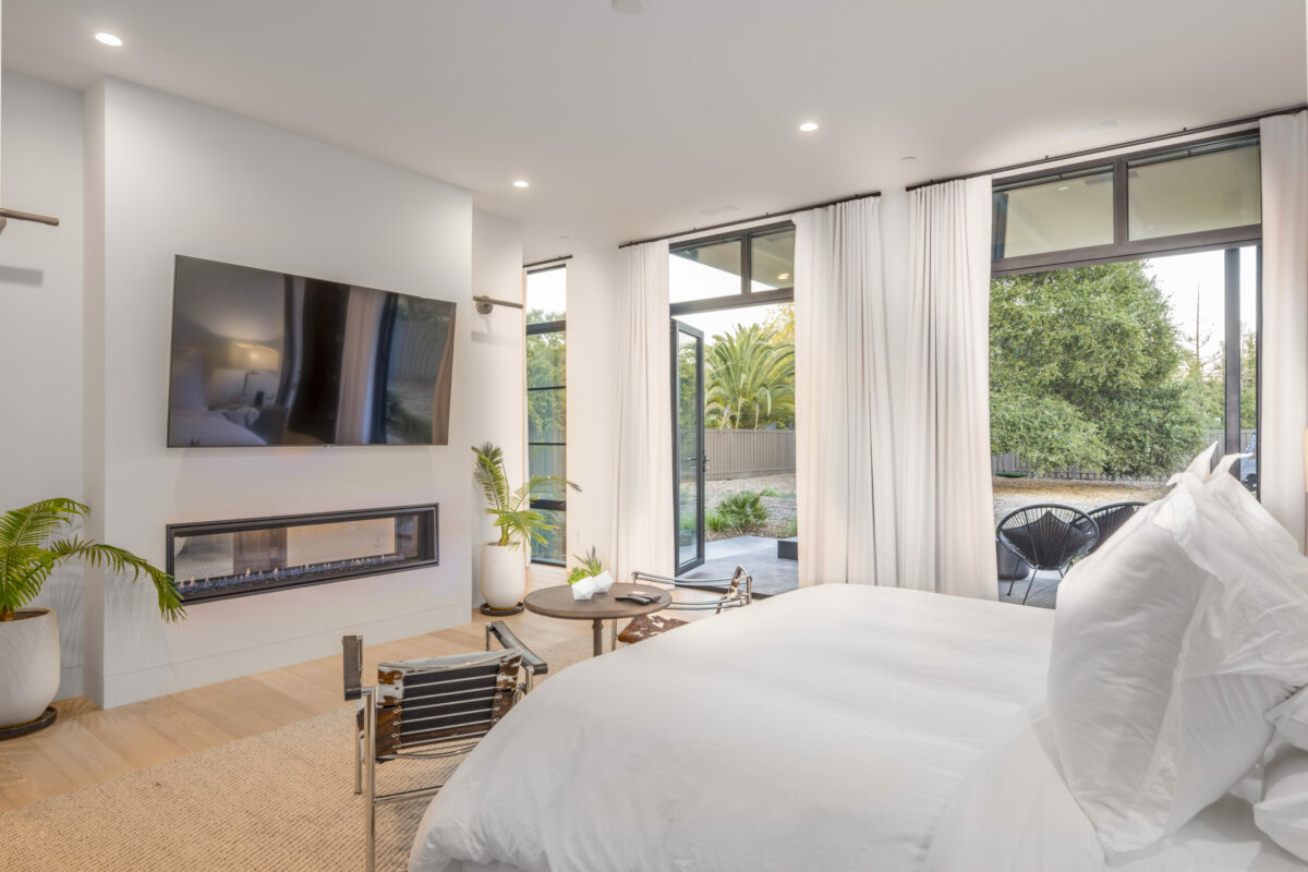 The main bedroom has a fireplace and lots of light. (Provided by Carol Sebastiani of Sotheby's International Realty)