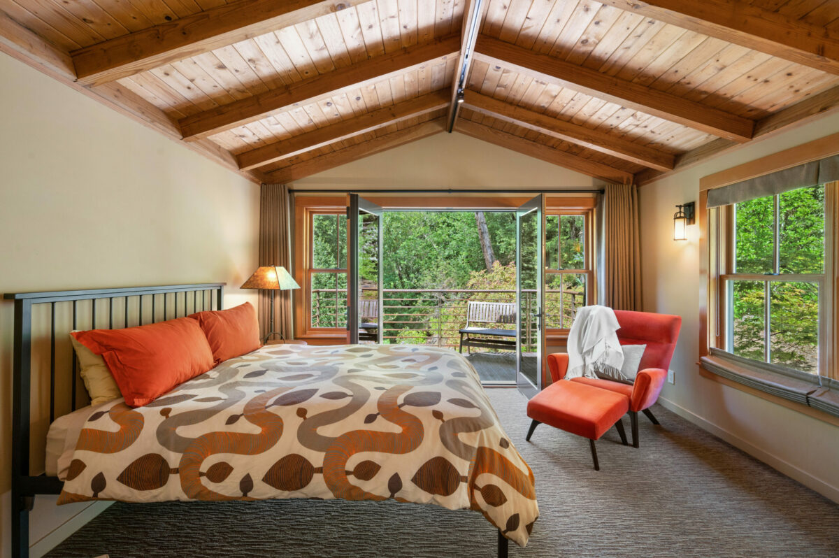 This bedroom has views plus easy outdoor access. (Lunghi Studios)
