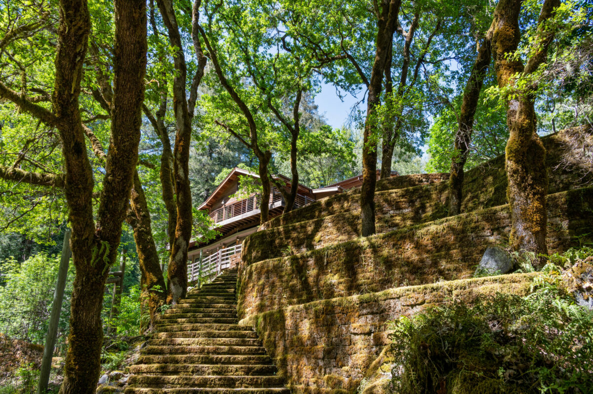 Steps from the home lead to Austin Creek. (Lunghi Studios)