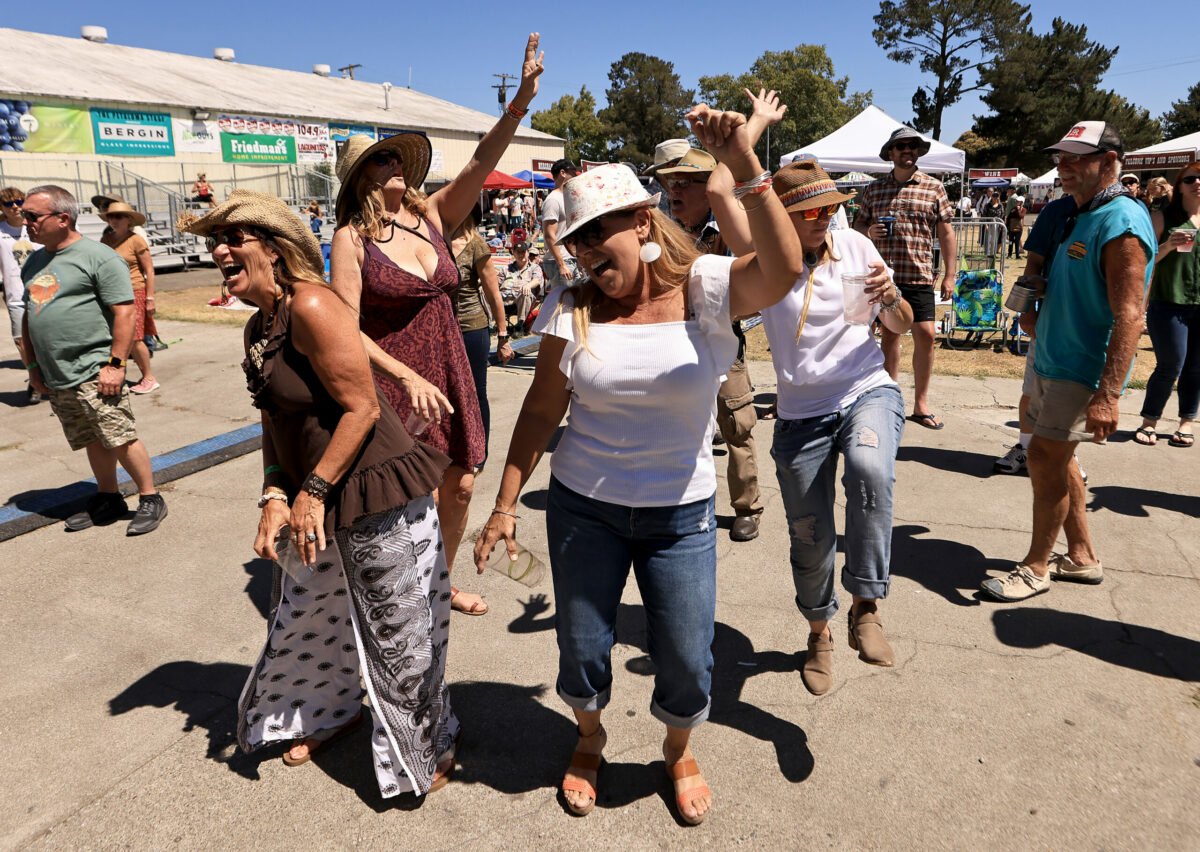 The audience dances to music by Jackie Venson during the Petaluma Music Festival, Saturday, August 6, 2022. (Kent Porter / The Press Democrat) 2022