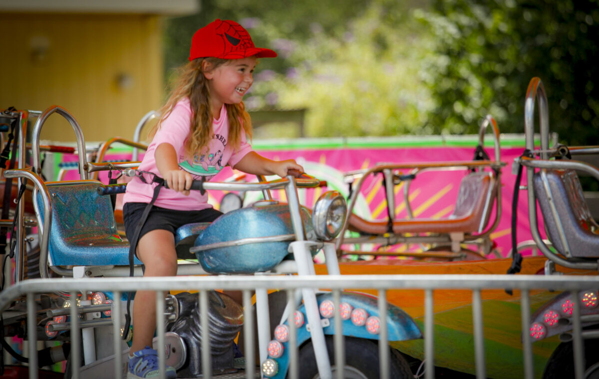 Sofia Fortney, 4, enjoying a ride on opening day of the Sonoma-Marin Fair in Petaluma._Wednesday, June 22, 2022._Petaluma, CA, USA._(CRISSY PASCUAL/ARGUS-COURIER STAFF)