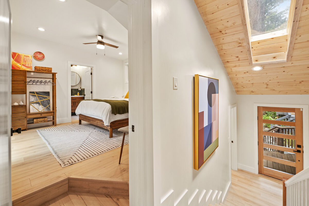 Skylights and ample windows maximize the outdoor views. (Open Homes Photography)