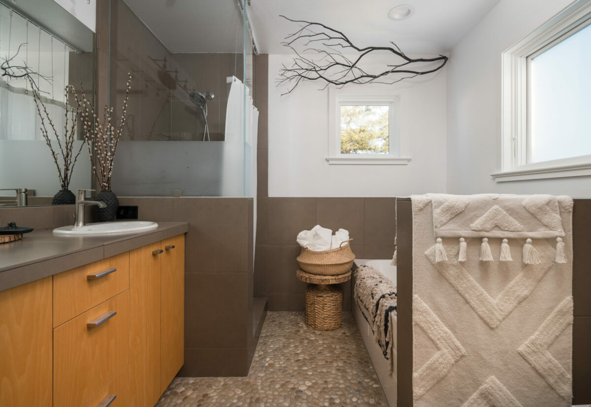 The bathroom is tonal and rich in textures. (Adam Potts)