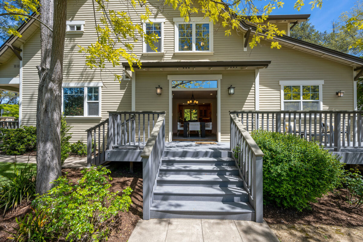 Steps lead from the dining room to the yard. (Open Homes Photography)
