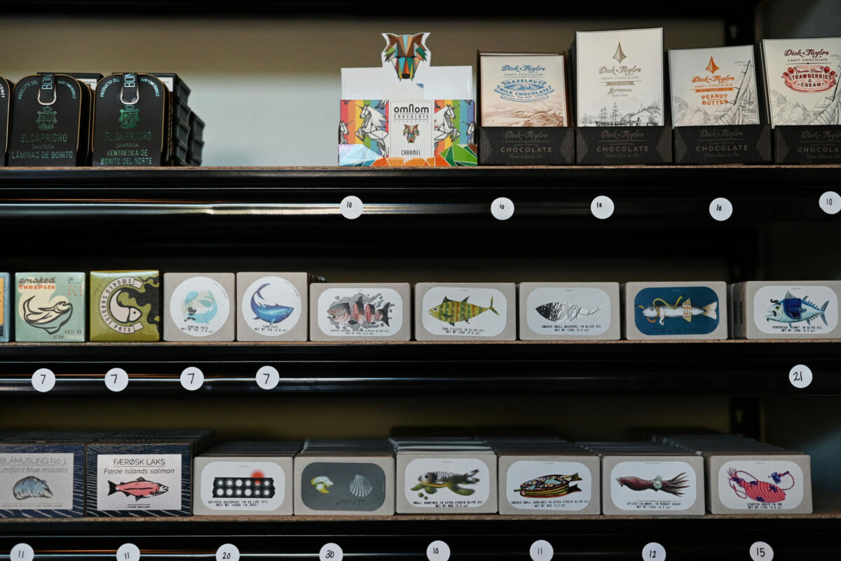 Chocolates and a wide variety of tinned seafood at The Punchdown Natural Wine Bar + Bottle Shop during a friends and family soft opening on Friday, May 12, 2023 in the Barlow in Sebastopol. (Erik Castro / For The Press Democrat)