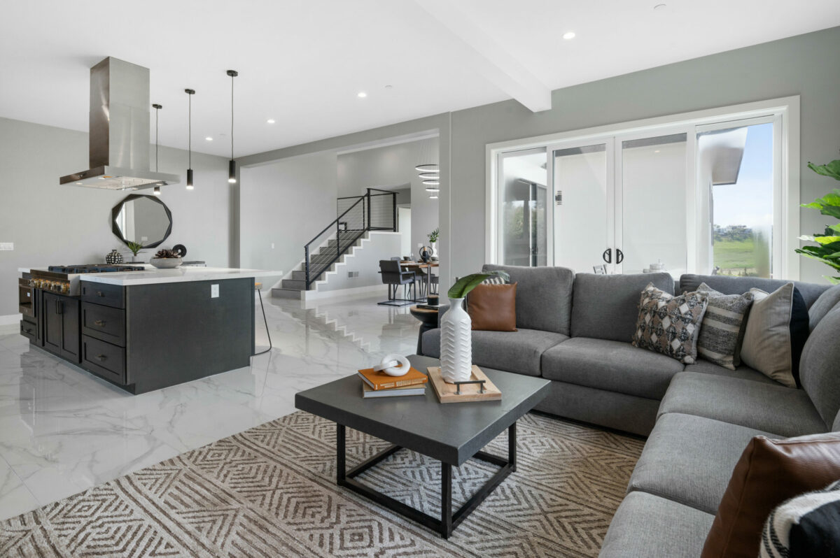 A seating area allows for some cozy lounging next to the kitchen. (Lunghi Studios)