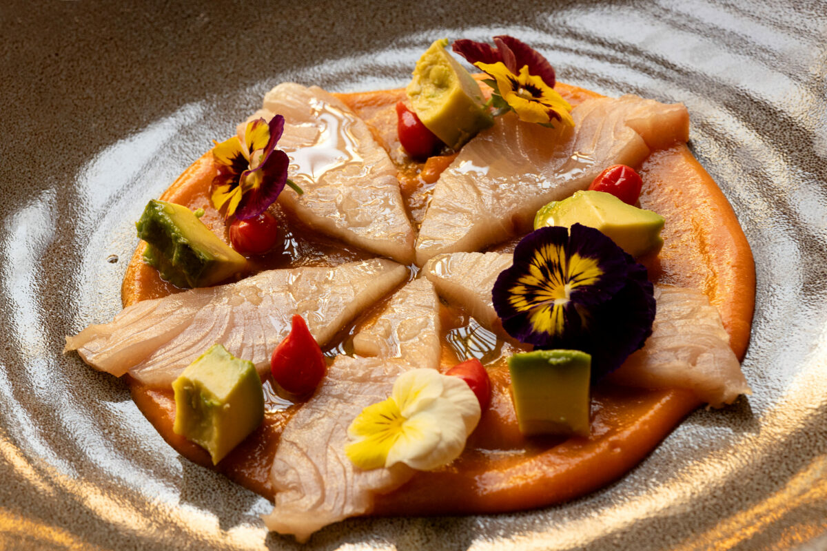 Yellowtail Hamachi wtih carrot-ginger nage, marinated peppers and avocado from Goodnight’s Prime Steak + Spirits Friday, August 11, 2023 on the square in Healdsburg. (Photo John Burgess/The Press Democrat)