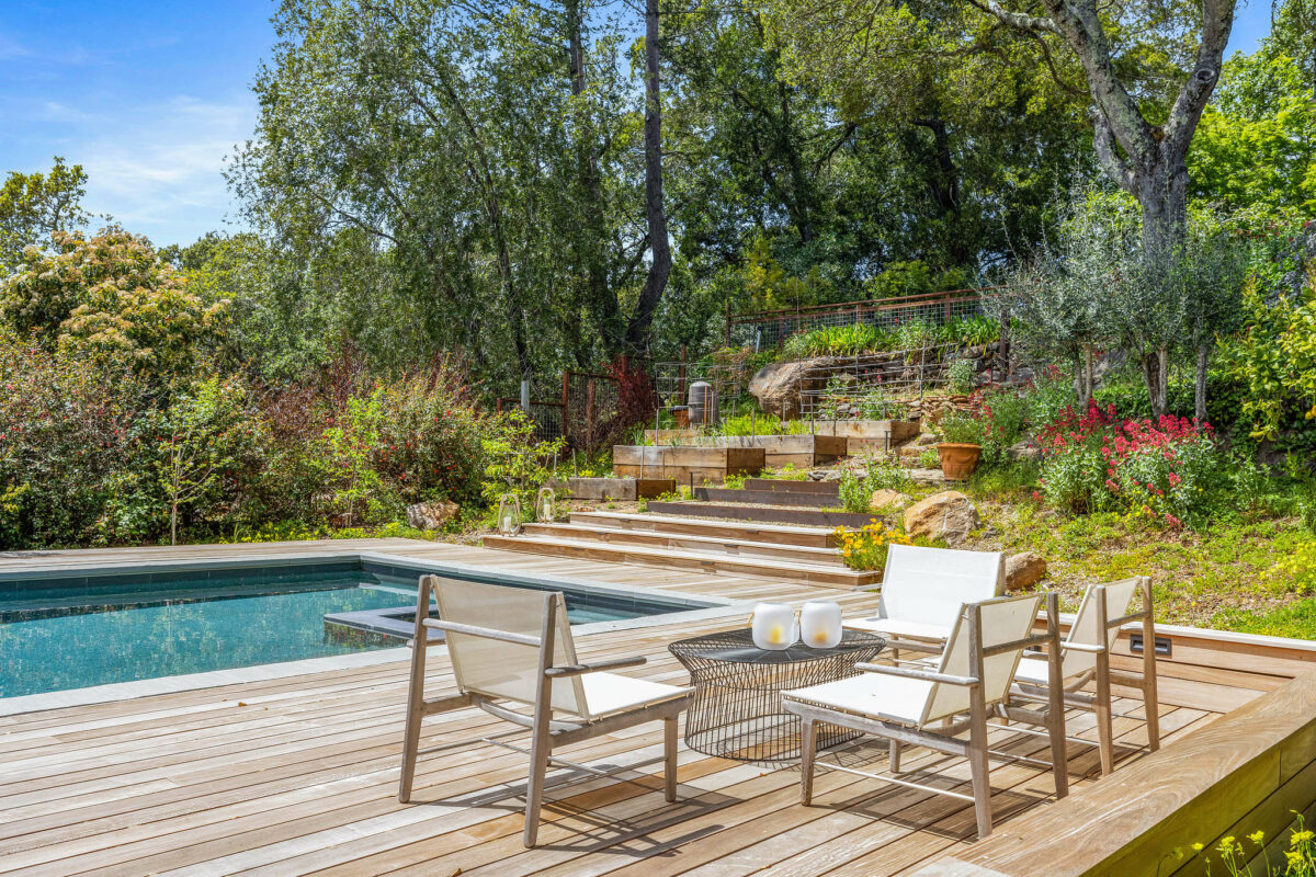 The yard has 20 fruit trees and raised beds. (Open Homes Photography)