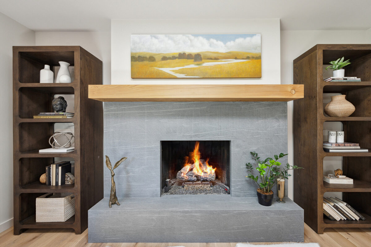 The fireplace has been updated with a stone face. (Open Homes Photography)