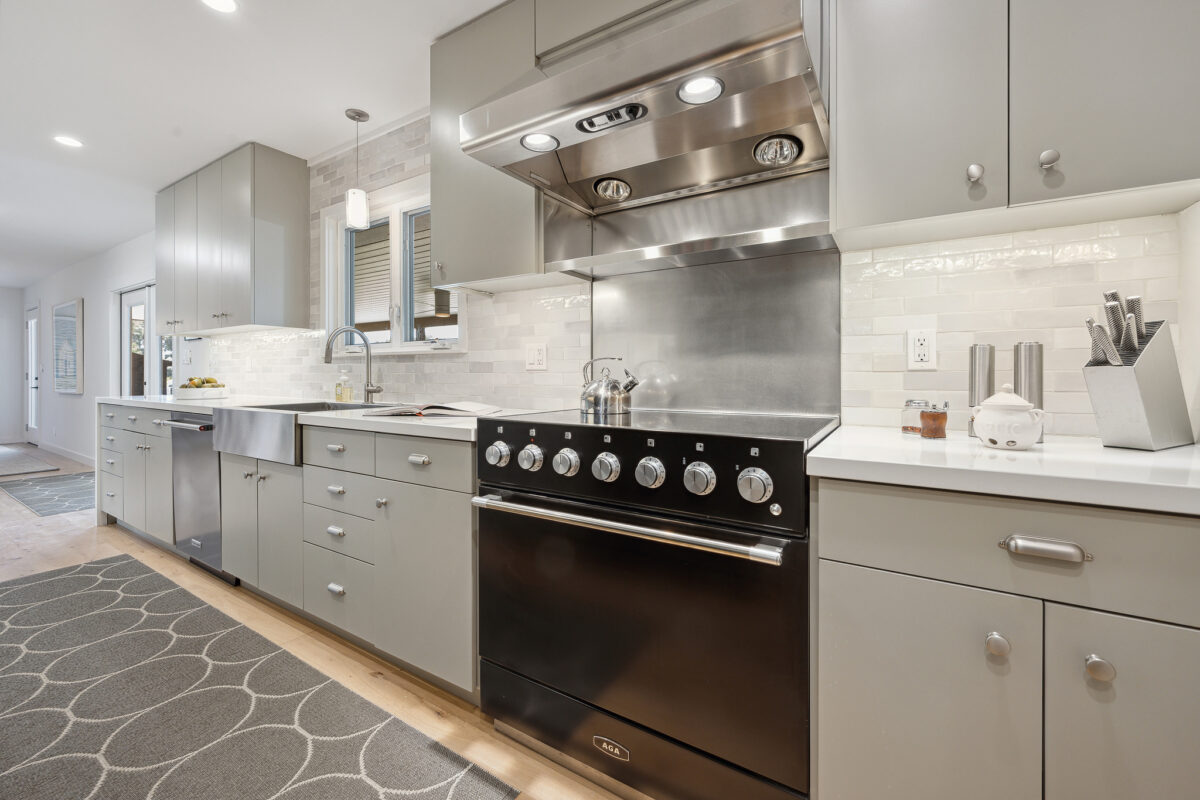 The kitchen has new finishes and luxury appliances. (Open Homes Photography)