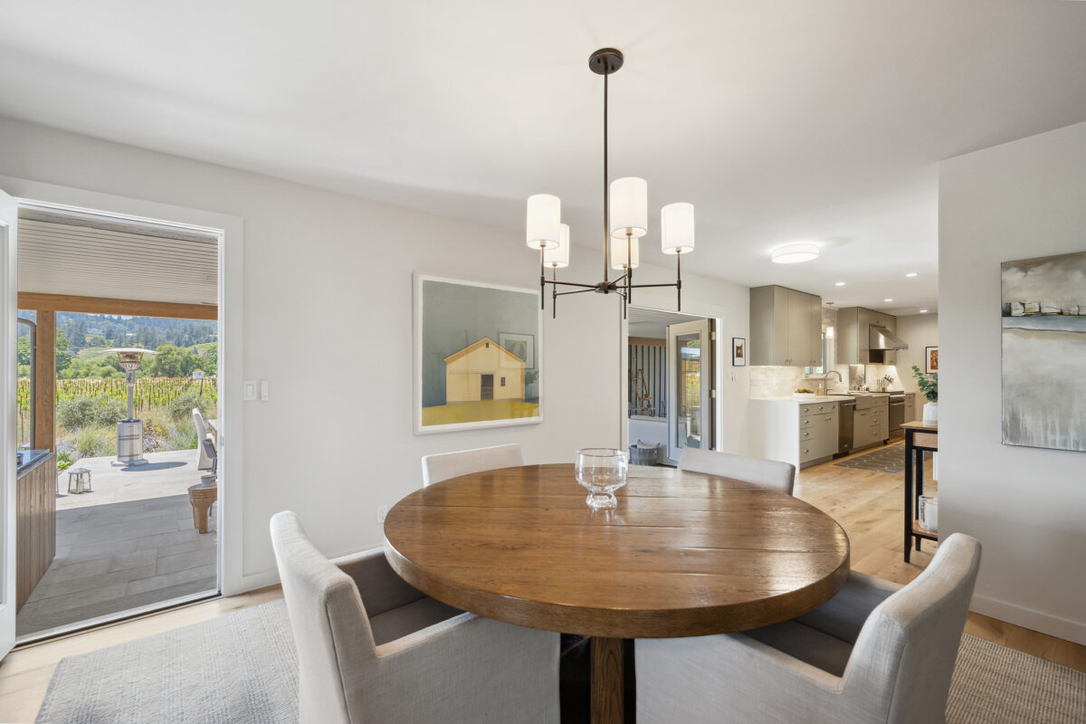 New lighting, smoothed walls and wide wood-planked floors makes this 1950s home feel modern. (Open Homes Photography)