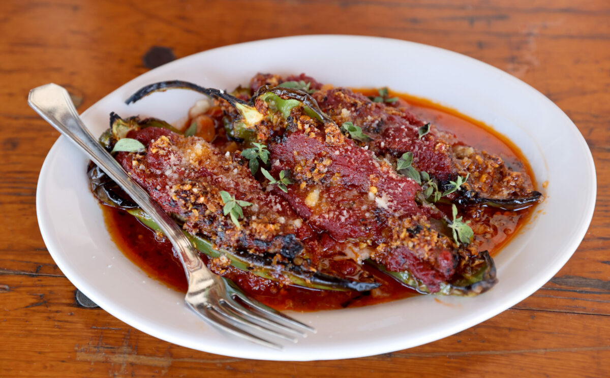 Meatball stuffed peppers in a braising sauce with a chili crisp at Ciccio in Yountville, Monday, July 10, 2023. (Beth Schlanker / The Press Democrat)