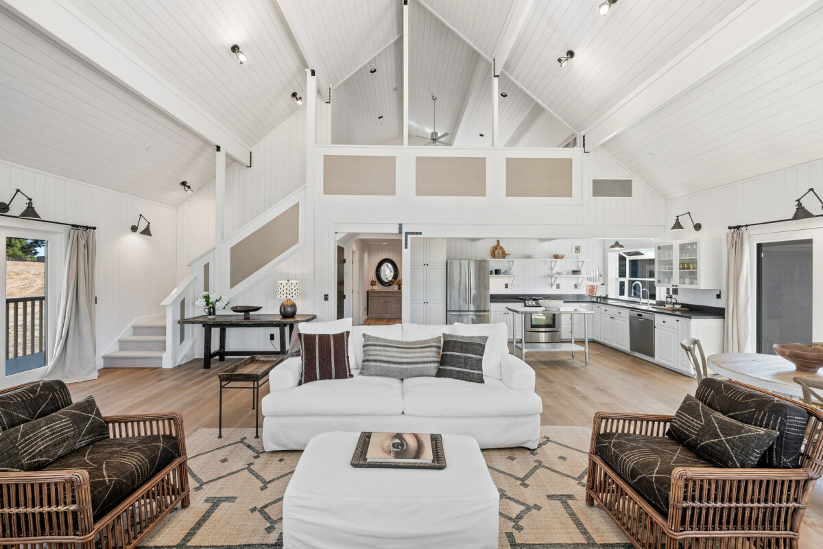 The home has a loft and has been remodeled with oak floors, a new bathroom and a new kitchen. (Open Homes Photography)