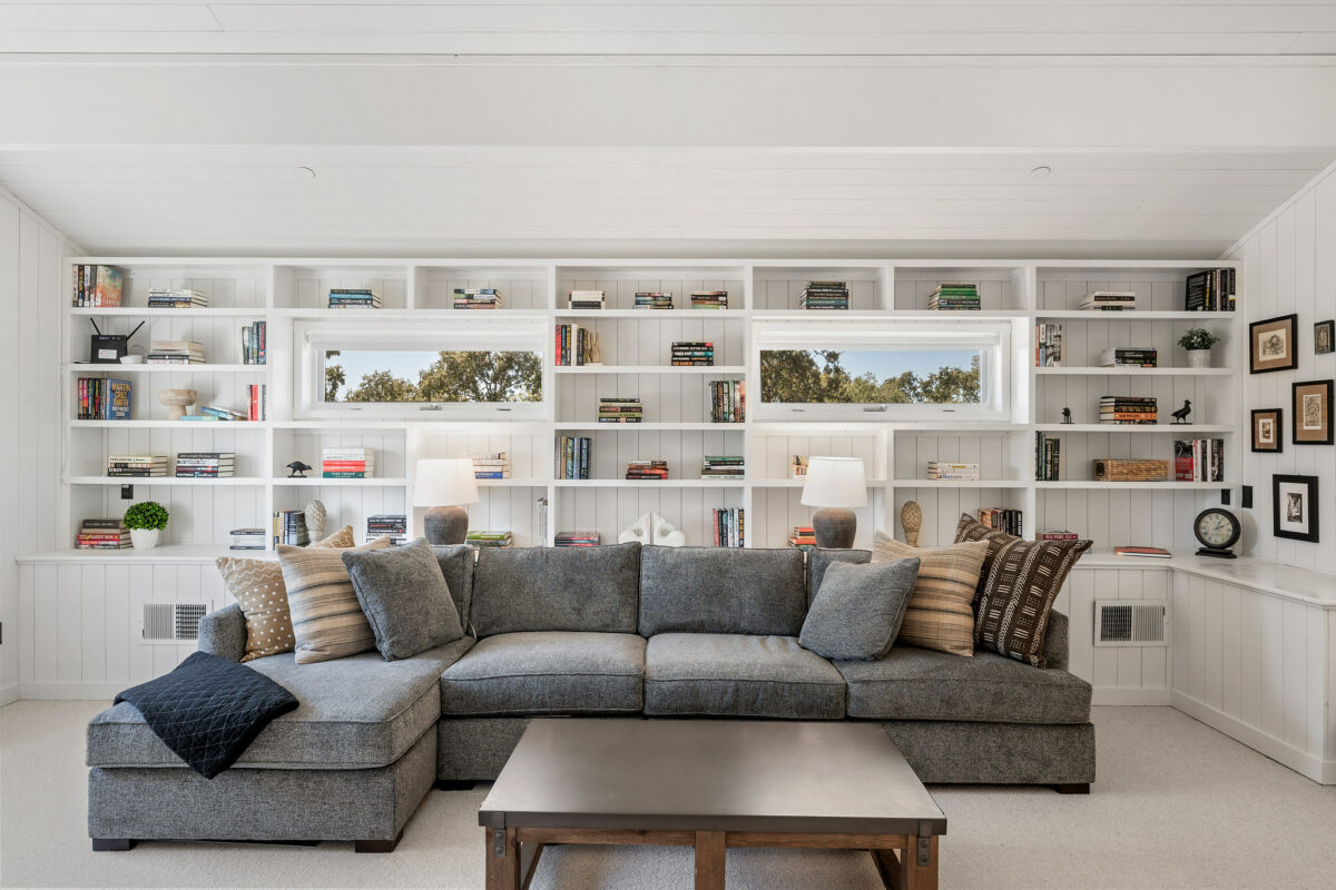 Vertical siding and built-ins really make this modern home cozy. (Open Homes Photography)