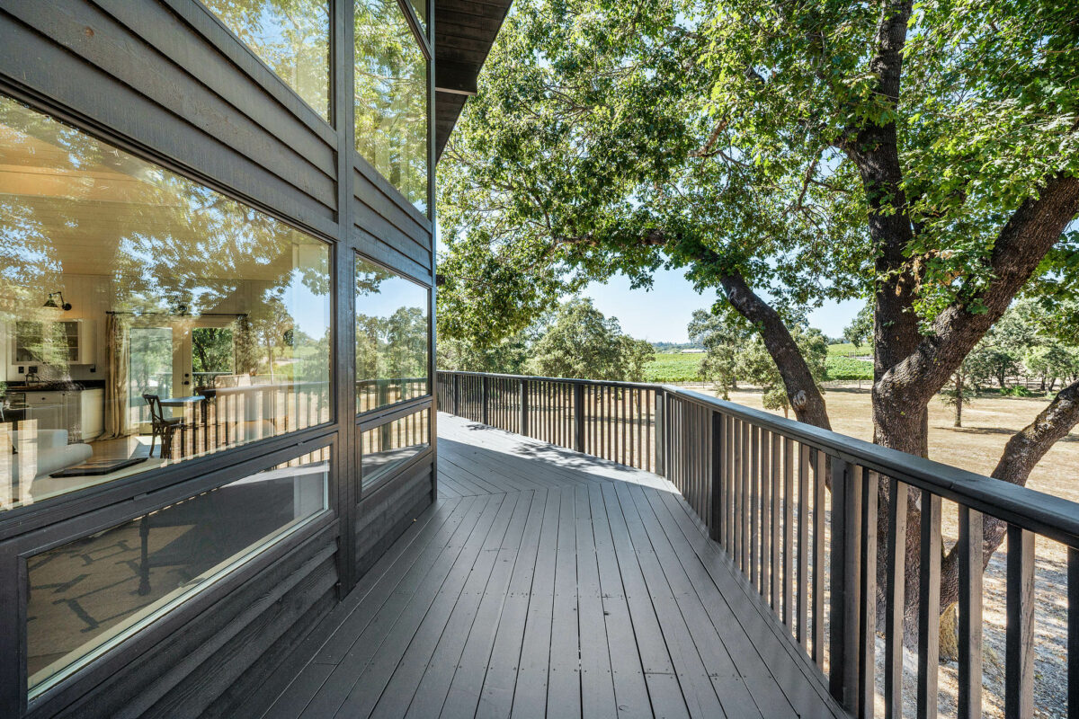 A wraparound porch allows for more vineyard-gazing. (Open Homes Photography)