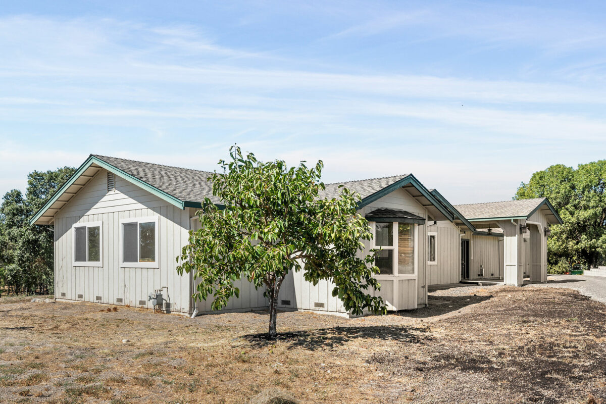 The second home on the property is 3000+ square feet and is in need of renovation. (Open Homes Photography)