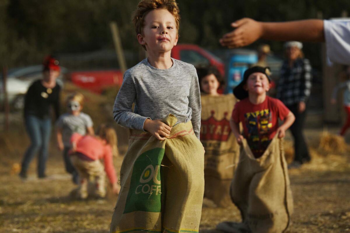 Jack Silva, 7, of San Rafael, California leading the pack during the potato sack race at Pumpkins on Pikes held Saturday at Tara Firma Farms in Petaluma, California. October 19, 2019.(Photo: Erik Castro/for The Press Democrat)