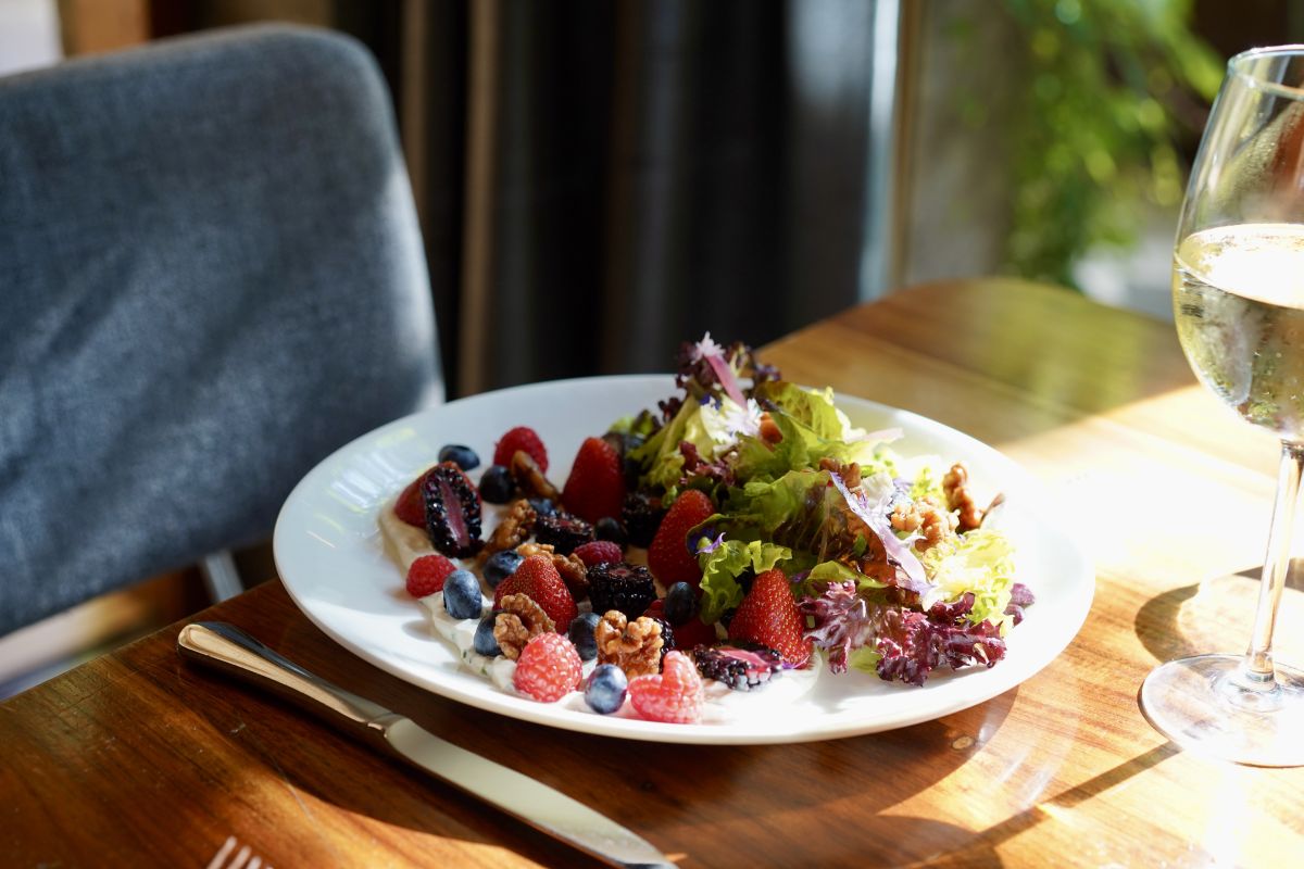 The Laura Chenel Goat Cheese Salad with local lettuces, fresh berries and candied walnuts at h2hotel’s restaurant, Spoonbar, in Healdsburg.