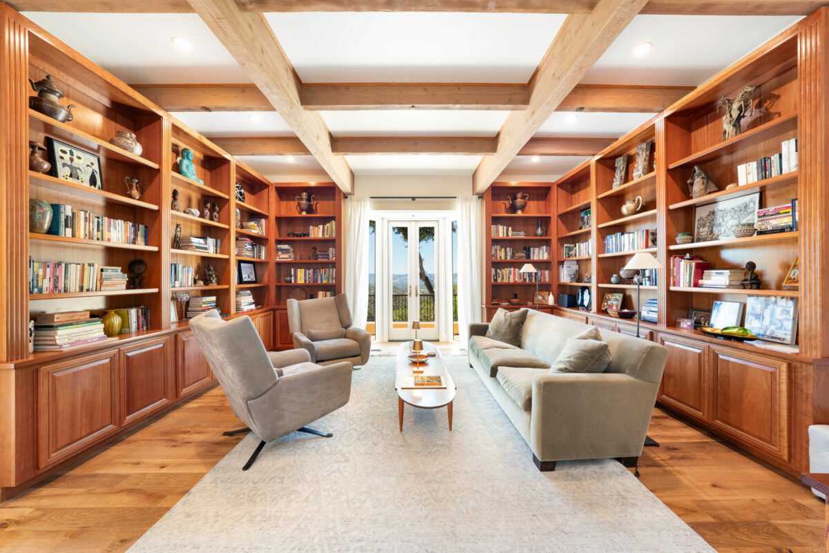 The library enjoys richly designed built-in cabinets. (Ned Bonzi)
