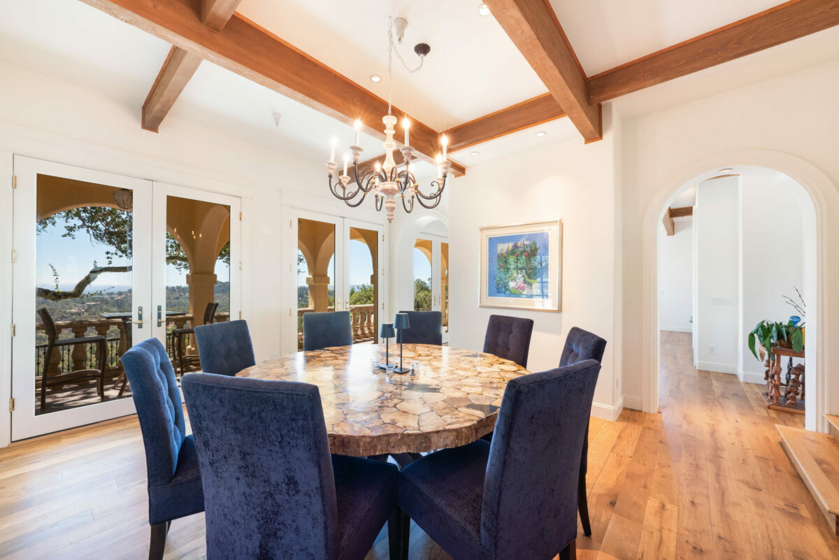 The dining area enjoys views and access to the loggia. (Ned Bonzi)