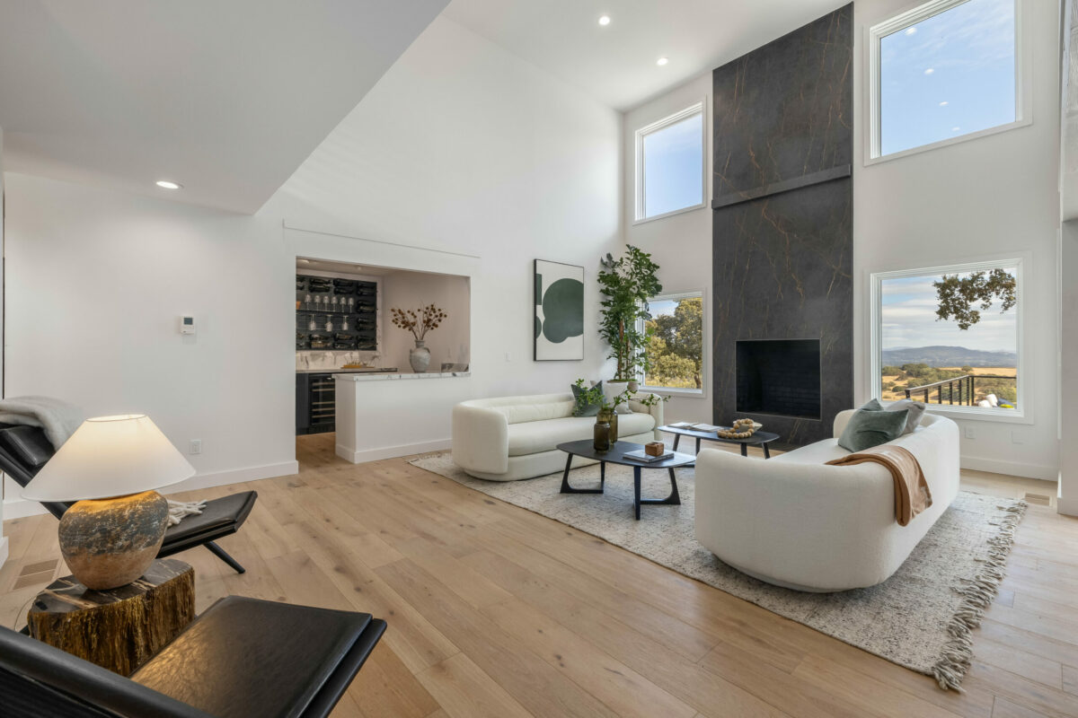 Living room with an adjacent wine bar. (Stephen Sugg / Sotheby’s International Realty)