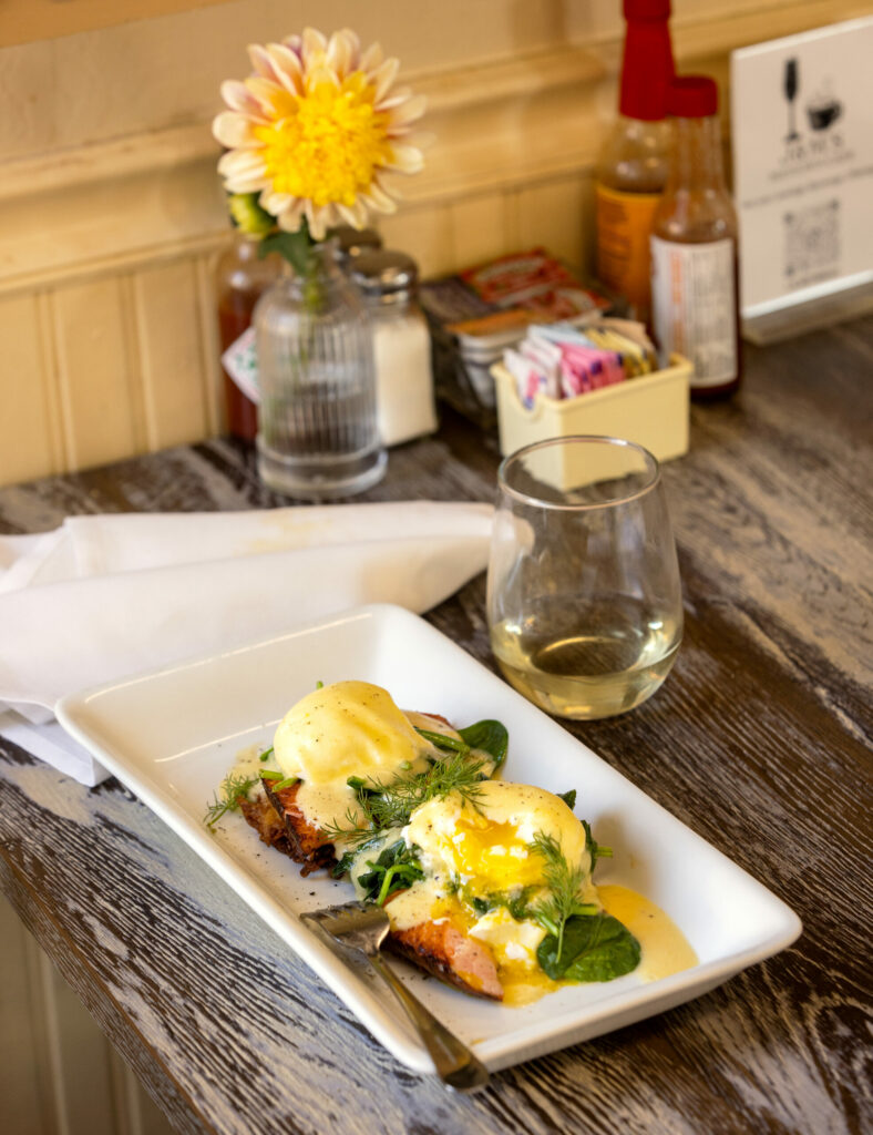 Meiomei Chardonnay with House-Smoked Salmon Latkes Benedict from the new J & M’s Midtown Café October 23, 2023, in Santa Rosa. (Photo John Burgess/The Press Democrat)