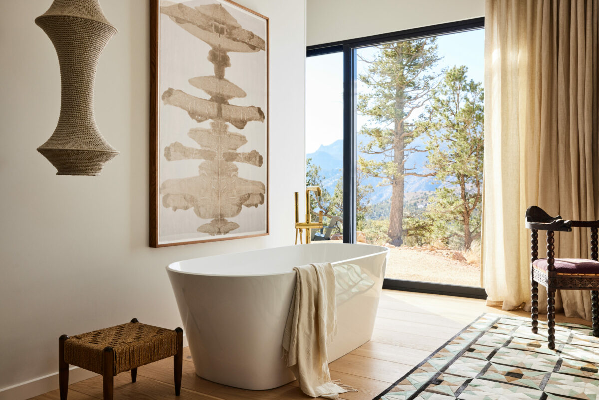 Intriguingly shaped accents enliven the ultra tranquil palette of this bathroom. (Nicole Franzen)