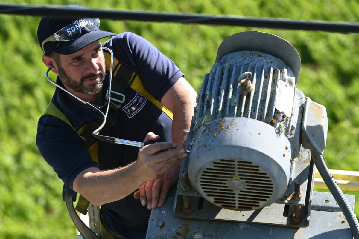 David Peritore of Winery Service Connection working on wine production equipment at Iron Horse Vineyards in Sebastopol, Calif. on July 13, 2023. (Photo: Erik Castro/for Sonoma Magazine)